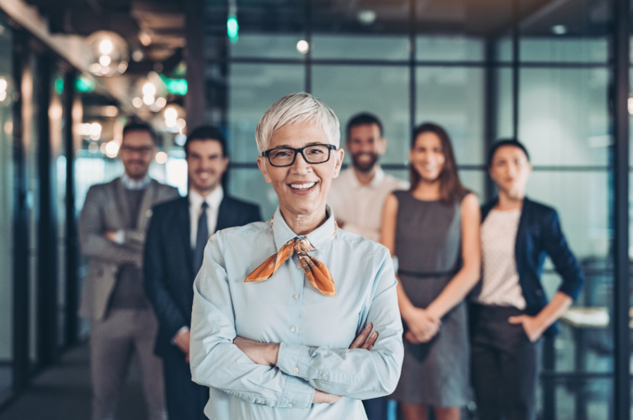 A group of people standing in front of each other.