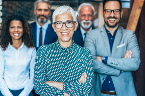 A group of people standing next to each other.