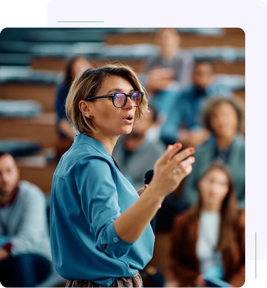 A woman is giving a presentation to an audience.